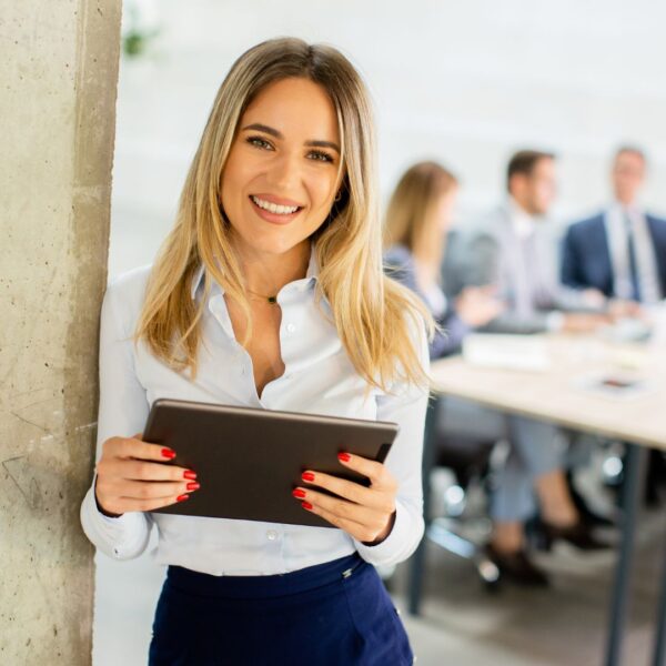 business woman breathing easy in an office
